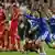 Chelsea players cheering, Bayern players dejected after penalty shootout