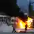 A truck burns during clashes between supporters of the extreme far-right Golden Dawn and police after an anti-immigrant protest in the southwestern Greek port of Patras on Tuesday, May 22, 2012. The marches followed the fatal stabbing of a local man, allegedly by Afghan illegal immigrants. Golden Dawn, which rejects the neo-Nazi tab, elected 21 legislators in last month's national elections, entering Parliament for the first time on a tide of anti-immigration sentiment. (Foto:Giannis Androutsopoulos/AP/dapd)