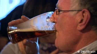 Man drinking stout