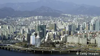 SEOUL, SOUTH KOREA - MARCH 3: A General view of Seoul city on March 3, 2006 in Seoul, South Korea. Seoul has a population of 10,297,004 as of the end of 2005. This accounts for about a quarter of the total national population. The number of foreign residents in Seoul as of the end of 2005 is 129,660 or about 1.3 % of Seoul's total population. They include 77,881 Chinese, 11,487 Americans, and 6,710 Japanese. There are people of more than 90 different nationalities currently residing in Seoul, forming a small global village. (Photo by Chung Sung-Jun/Getty Images)