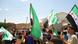 Demonstrators hold opposition flags during a protest against Syria's President Bashar al-Assad after Friday prayers in Deraa May 25, 2012. REUTER/Handout (SYRIA - Tags: CIVIL UNREST POLITICS CONFLICT) FOR EDITORIAL USE ONLY. NOT FOR SALE FOR MARKETING OR ADVERTISING CAMPAIGNS. THIS IMAGE HAS BEEN SUPPLIED BY A THIRD PARTY. IT IS DISTRIBUTED, EXACTLY AS RECEIVED BY REUTERS, AS A SERVICE TO CLIENTS Demonstrators hold opposition flags during a protest against Syria's President Bashar al-Assad after Friday prayers in Deraa May 25, 2012. REUTER/Handout (SYRIA - Tags: CIVIL UNREST POLITICS CONFLICT) FOR EDITORIAL USE ONLY. NOT FOR SALE FOR MARKETING OR ADVERTISING CAMPAIGNS. THIS IMAGE HAS BEEN SUPPLIED BY A THIRD PARTY. IT IS DISTRIBUTED, EXACTLY AS RECEIVED BY REUTERS, AS A SERVICE TO CLIENTS