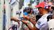 Rennfahrer Lewis Hamilton gibt Fans Autogramme Photo: Jens Buettner dpa +++(c) dpa - Bildfunk+++ Rennfahrer Lewis Hamilton gibt Fans Autogramme Photo: Jens Buettner dpa +++(c) dpa - Bildfunk+++