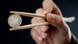 euro coin with chopsticks euro coin with chopsticks