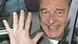 Former French President Jacques Chirac waves from inside a car Former French President Jacques Chirac waves from inside a car