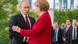 German Chancellor Angela Merkel (R) welcomes Russian President Vladimir Putin before talks at the Chancellery in Berlin, June 1, 2012. REUTERS/Thomas Peter (GERMANY - Tags: POLITICS) German Chancellor Angela Merkel (R) welcomes Russian President Vladimir Putin before talks at the Chancellery in Berlin, June 1, 2012. REUTERS/Thomas Peter (GERMANY - Tags: POLITICS)