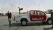 Tripoli airport with small armed pick-up truck in foreground Tripoli airport with small armed pick-up truck in foreground