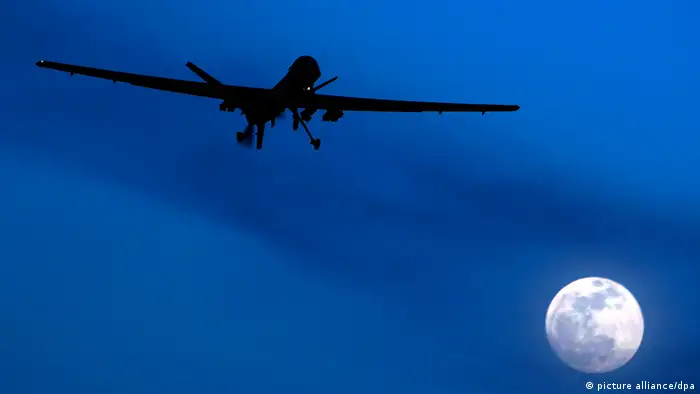 FILE - In this Jan. 31, 2010 file photo an unmanned U.S. Predator drone flies over Kandahar Air Field, southern Afghanistan, on a moon-lit night. Drones are often called the weapon of choice of the Obama administration, which quadrupled drone strikes against al-Qaida targets in Pakistan's lawless tribal areas, up from less than 50 under the Bush administration to more than 220 in the past three years. (AP Photo/Kirsty Wigglesworth, File)