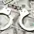 Crime law handcuffs arrest paper dollars