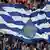 Greece soccer fans cheer for their team at the Euro 2012 soccer championship