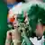 Ireland's fans watch the Euro 2012 soccer championship Group C match between Ireland and Croatia