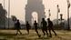 Youths play soccer early in the morning near the India Gate in New Delhi, India, Friday, Oct. 1, 2010. New Delhi will host the Commonwealth Games, which are scheduled to begin on Sunday. (AP Photo/Eranga Jayawardena) Youths play soccer early in the morning near the India Gate in New Delhi, India, Friday, Oct. 1, 2010. New Delhi will host the Commonwealth Games, which are scheduled to begin on Sunday. (AP Photo/Eranga Jayawardena)