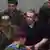 Nekada najbogatiji covjek Rusije - Michail Hodorkovski (u sredini) nakon izricanja presude u moskovskom sudu