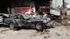 People inspect the scene of a car bomb attack in the Karrada neighborhood of Baghdad, Iraq, Wednesday, June 13, 2012. Wave of bombings targeted religious processions during the annual pilgrimage commemorating the 8th century death of a revered Shiite imam, killing and wounding scores of people, police said. (Foto:Karim Kadim/AP/dapd) People inspect the scene of a car bomb attack in the Karrada neighborhood of Baghdad, Iraq, Wednesday, June 13, 2012. Wave of bombings targeted religious processions during the annual pilgrimage commemorating the 8th century death of a revered Shiite imam, killing and wounding scores of people, police said. (Foto:Karim Kadim/AP/dapd)
