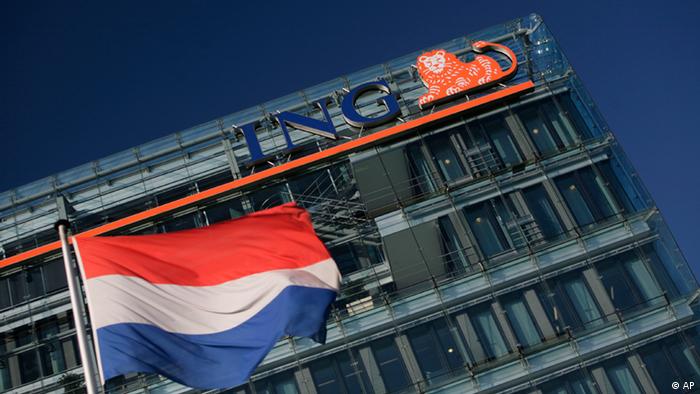 A Dutch flag flies outside ING head office in Amsterdam, Netherlands