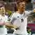 Germany's Lukas Podolski is jubilant after scoring against Denmark
