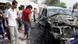 People gather near the car of a military commander after a suicide bomber blew himself up next to it killing the official in the southern Yemeni city of Aden June 18, 2012 People gather near the car of a military commander after a suicide bomber blew himself up next to it killing the official in the southern Yemeni city of Aden June 18, 2012
