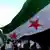 Demonstrators against Assad wave flags in Damascus on June 26, 2012