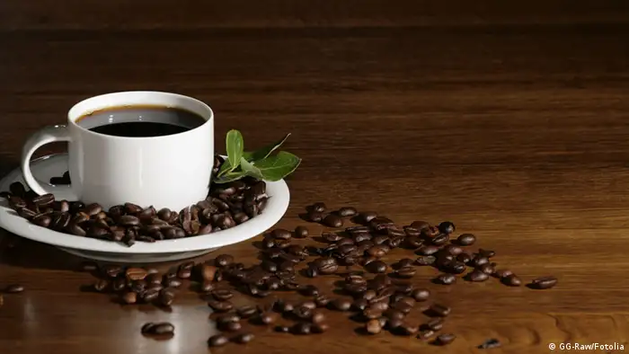 Kaffeetasse Tisch Kaffeebohnen