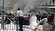Civil Defence members extinguish fires on cars at the site of an explosion outside Syria's highest court in central Damascus on Thursday. REUTERS/SANA/Handout Civil Defence members extinguish fires on cars at the site of an explosion outside Syria's highest court in central Damascus on Thursday. REUTERS/SANA/Handout