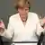 Bundeskanzlerin Angela Merkel (CDU) gibt am Freitag (29.06.2012) vor dem Bundestag in Berlin eine Regierungserklärung ab. Am Abend stimmt das Parlament nach dem Sondergipfel von Brüssel über den Fiskalpakt und über den Europäischen Rettungsschirm ESM ab. Foto: Sebastian Kahnert dpa/lbn +++(c) dpa - Bildfunk+++