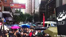 香港变围城，警察指喊话胡锦涛记者违规