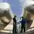 At the Vattenfall experimental power plant in the Schwarze Pumpe district of Spremberg in southern Brandenburg, two employees stand between CO2 storage tanks, recorded on 02.09.2008.
