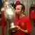 Andres Iniesta of Spain poses in the dressing room with the trophy