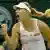 Angelique Kerber jubelt nach ihrem Sieg im Wimbledon-Viertelfinale gegen Sabine Lisicki. Foto: Reuters