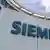 Siemens-Logo vor Zentrale in München (Foto: AP)