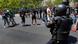 Riot police carrying rubber bullet launchers confront demonstrators during a coal miners march in Madrid Riot police carrying rubber bullet launchers confront demonstrators during a coal miners march in Madrid