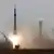 The Soyuz spacecraft blasts off from its launch pad at Baikonur cosmodrome
