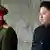 North Korean leader Kim Jong-un, right, stood next to a high-ranking soldier