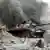 Panzer im Einsatz gegen die Aufständischen (Foto: dpa)