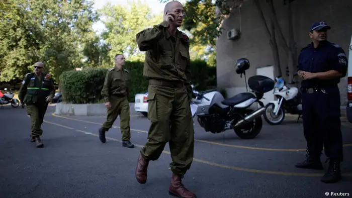 An Israeli military personnel arrive at a hospital in the city of Burgas, about 400km (248miles) east of Sofia July 19, 2012. A suicide bomber committed the attack that killed eight people in a bus transporting Israeli tourists at a Bulgarian airport, the country's interior minister said on Thursday, and Israel accused Iranian-backed Hezbollah militants of responsibility. REUTERS/Stoyan Nenov (BULGARIA - Tags: CRIME LAW TRANSPORT)