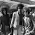 Noel Redding, lijevo, Jimi Hendrix, u sredini, i Mitch Mitchell na londonskom aerodromu Heathrow 1967.