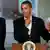 U.S. President Barack Obama (C) demonstrates a story of survival while speaking at the University of Colorado Hospital after he met with families bereaved after a gunman went on a shooting rampage at a movie theater in Aurora, Colorado July 22, 2012. Standing beside Obama are U.S. Senator Mark Udall (L) and Colorado Governor John Hickenlooper (R). Obama headed to Aurora, Colorado, on Sunday to meet families grieving their losses Friday's mass shooting that has stunned the nation and rekindled debate about guns and violence in America. REUTERS/Larry Downing (UNITED STATES - Tags: POLITICS CRIME LAW TPX IMAGES OF THE DAY)