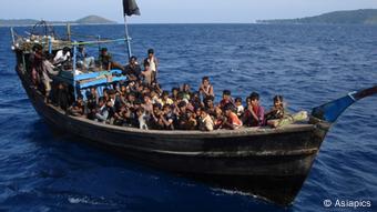 A powerless or engineless boat loaded with Rohingya refugees, moments before it was rescued by Indian Coastguards off Andaman Islands (Copyright: Asiapics 2010, near Andaman & Nicobar Islands, India) A powerless or engineless boat loaded with Rohingya refugees, moments before it was rescued by Indian Coastguards off Andaman Islands (Copyright: Asiapics 2010, near Andaman & Nicobar Islands, India)