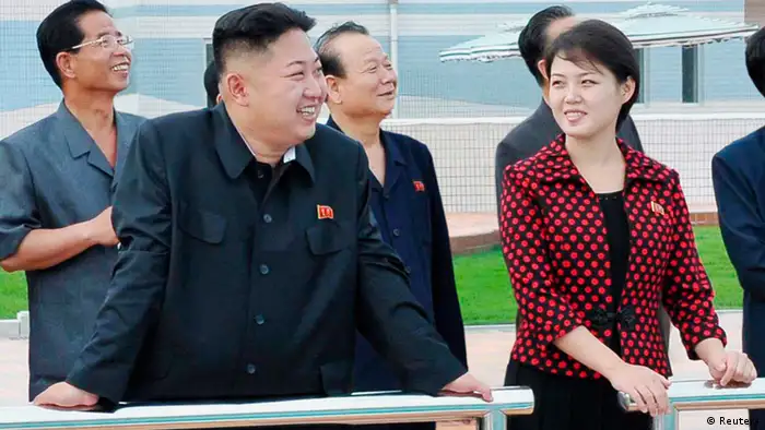 REFILE - ADDITIONAL CAPTION INFORMATION North Korean leader Kim Jong-Un (2nd L) and his wife, who was named by the state broadcaster as Ri Sol-ju, visit the Rungna People's Pleasure Ground, in Pyongyang in this undated picture released by the North's KCNA on July 25, 2012. Kim Jong-un has married, state media said on Wednesday, putting an end to speculation over the relationship with a woman seen at his side during a recent gala. REUTERS/KCNA (NORTH KOREA - Tags: POLITICS TPX IMAGES OF THE DAY) THIS IMAGE HAS BEEN SUPPLIED BY A THIRD PARTY. IT IS DISTRIBUTED BY REUTERS, AS A SERVICE TO CLIENTS. NO THIRD PARTY SALES. NOT FOR USE BY REUTERS THIRD PARTY DISTRIBUTORS. QUALITY FROM SOURCE
