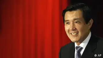 Taiwan's president-elect Ma Ying-jeou of opposition Nationalist Party smiles during a press conference a day after the presidential election in Taipei, Taiwan Sunday, March 23, 2008. Ma said Sunday he had no immediate plans to visit China and would work to fulfill his campaign pledge to improve relations with the communist neighbor, starting direct flights, allowing more Chinese tourists to visit and helping the island's financial industry go to the mainland. (AP Photo/Vincent Yu)