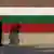 Стена, изрисувана в цветовете на българския флаг
