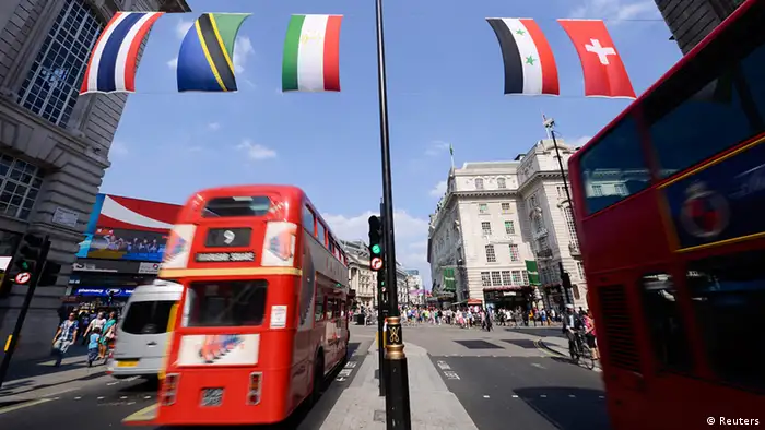 London Buses pass under a gap where the flag of Taiwan, also known as Chinese Taipei, has been taken down at the retail district of Lower Regents Street in London July 25, 2012. The International Olympic Committee decided in 1980 that Taiwan could only compete under the title Chinese Taipei and use a flag designed after the ruling. REUTERS/Ki Price (BRITAIN - Tags: SPORT OLYMPICS TRANSPORT POLITICS)