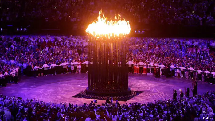 The Olympic cauldron is lit during the Opening Ceremony at the 2012 Summer Olympics, Saturday, July 28, 2012, in London. (AP Photo/Mark Baker)