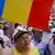 Supporters of Romania's suspended President Traian Basescu cheer during a rally in Bucharest July 26, 2012.