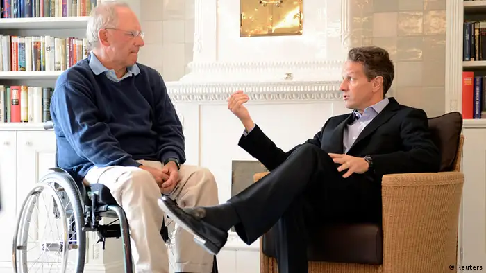 German Finance Minister Wolfgang Schaeuble (L) talks to his U.S. counterpart Timothy Geithner in Westerland on the German island of Sylt, July 30, 2012. REUTERS/Fabian Bimmer (GERMANY - Tags: POLITICS BUSINESS)
