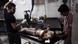 In this Sunday, July 29, 2012 photo, medics help a wounded man at the border town of Azaz, some 20 miles (32 kilometers) north of Aleppo, Syria. The U.N. said 200,000 Syrians have fled the embattled city of Aleppo since intense clashes between regime forces and rebels began 10 days ago. The government forces turned mortars, tank and helicopter gunships against rebel positions on Monday, July 30, 2012. (AP Photo/Turkpix) In this Sunday, July 29, 2012 photo, medics help a wounded man at the border town of Azaz, some 20 miles (32 kilometers) north of Aleppo, Syria. The U.N. said 200,000 Syrians have fled the embattled city of Aleppo since intense clashes between regime forces and rebels began 10 days ago. The government forces turned mortars, tank and helicopter gunships against rebel positions on Monday, July 30, 2012. (AP Photo/Turkpix)