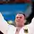 Germany's Ole Bischof celebrates after defeating Italy's Antonio Ciano (blue) in their men's -81kg elimination round of 32 judo match, at the London 2012 Olympic Games July 31, 2012.