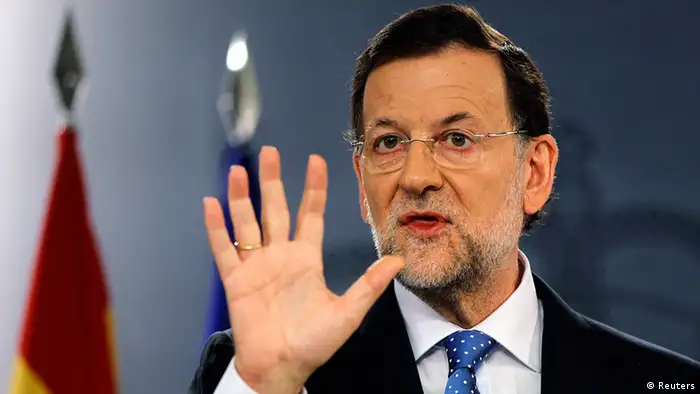 Spain's Prime Minister Mariano Rajoy gestures during a news conference at Madrid's Moncloa Palace August 3, 2012. Spain inched closer to seeking a sovereign bailout on Friday as Prime Minister Mariano Rajoy opened the door to a request, although he said he needed first to know the attached conditions as well as the form the rescue would take. REUTERS/Susana Vera (SPAIN - Tags: POLITICS BUSINESS)