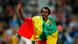 Tirunesh Dibaba waves to the crowd after a run with the Ethiopian flag around her shoulders Tirunesh Dibaba waves to the crowd after a run with the Ethiopian flag around her shoulders