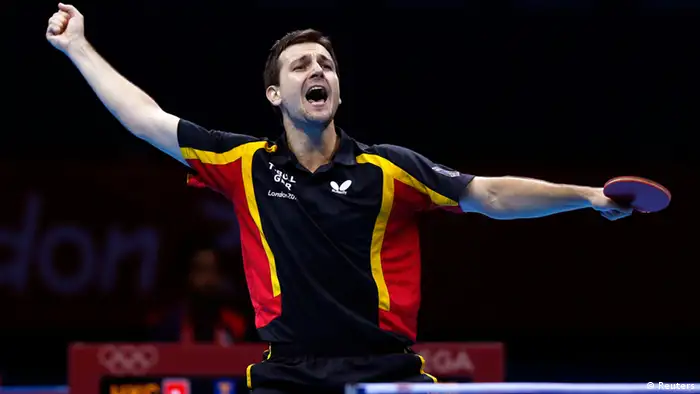 Germany's Timo Boll celebrates winning against HongKong's Jiang Tianyi in their men's team bronze medal table tennis singles match at the ExCel venue during the London 2012 Olympic Games August 8, 2012. Germany took the bronze medal. REUTERS/Grigory Dukor (BRITAIN - Tags: SPORT OLYMPICS SPORT TABLE TENNIS)