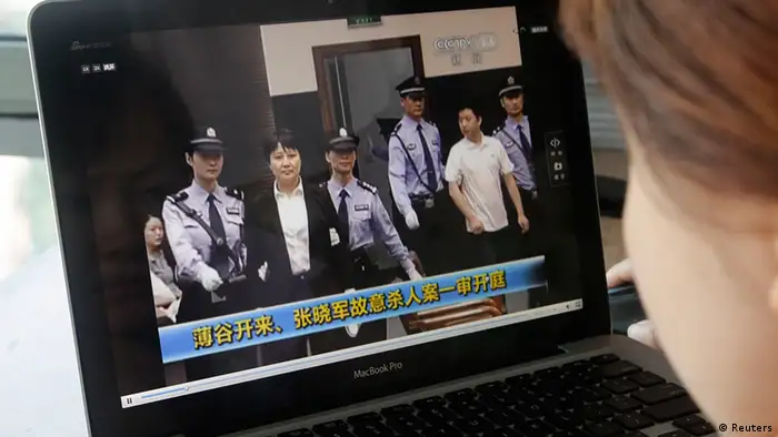 ediate People's Court, on a laptop in Beijing August 9, 2012. Gu Kailai, the wife of ousted Chinese Communist Party Politburo member Bo Xilai, did not raise objections in court on Thursday to charges against her of murdering a British businessman, a court official said. REUTERS/Jason Lee (CHINA - Tags: POLITICS CRIME LAW TPX IMAGES OF THE DAY)